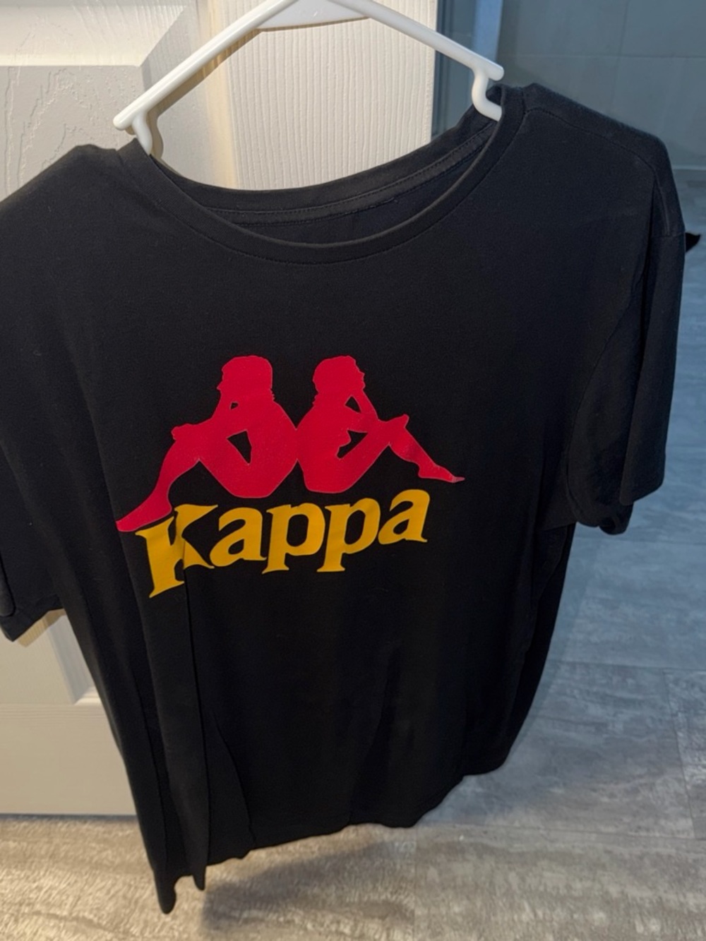 Kappa Black Tee with Red and Yellow Logo